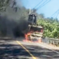 ‎Truk tronton bermuatan alat berat jenis Bomag hangus terbakar di ruas Jalan Trans Desa Marinsouw, Kecamatan Likupang Timur. (Dok. Istimewa)
