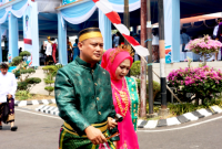 Kapolres Bitung AKBP Arie Sulistyo Nugroho, S.I.K., M.H., bersama Ketua Bhayangkari Cabang Bitung Ny. Hikma Arie Sulistyo Usai menghadiri kegiatan memperingati Hari Ulang Tahun (HUT) ke-36 Kota Bitung. (ft. humas polres bitung)